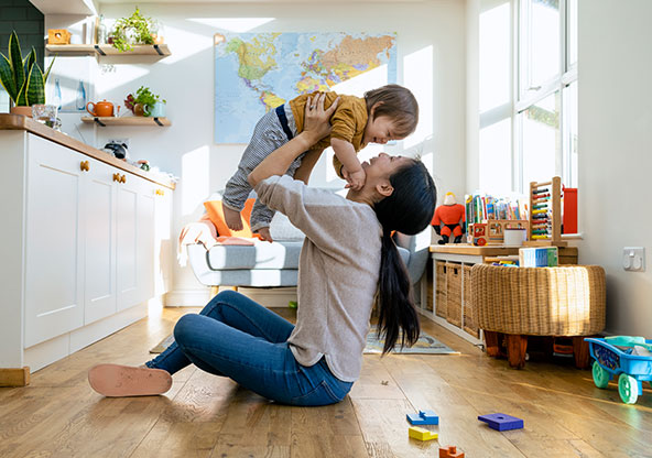 Mom holding toddler