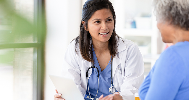 Doctor talking to patient